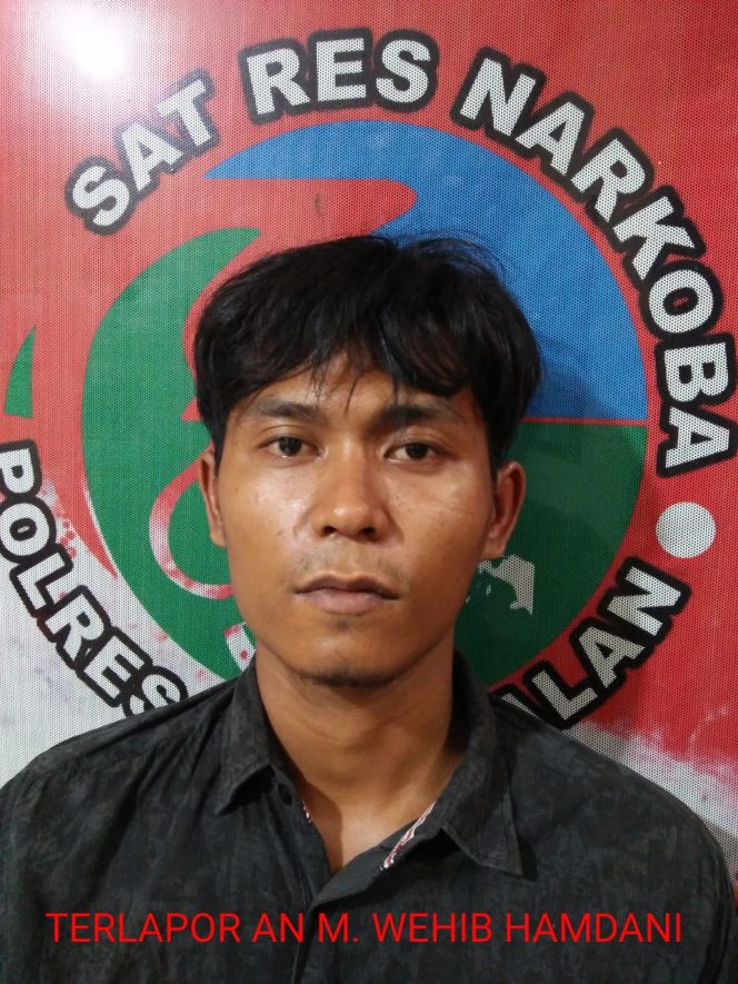 
Tersangka yang berhasil diamankan Polres Bangkalan